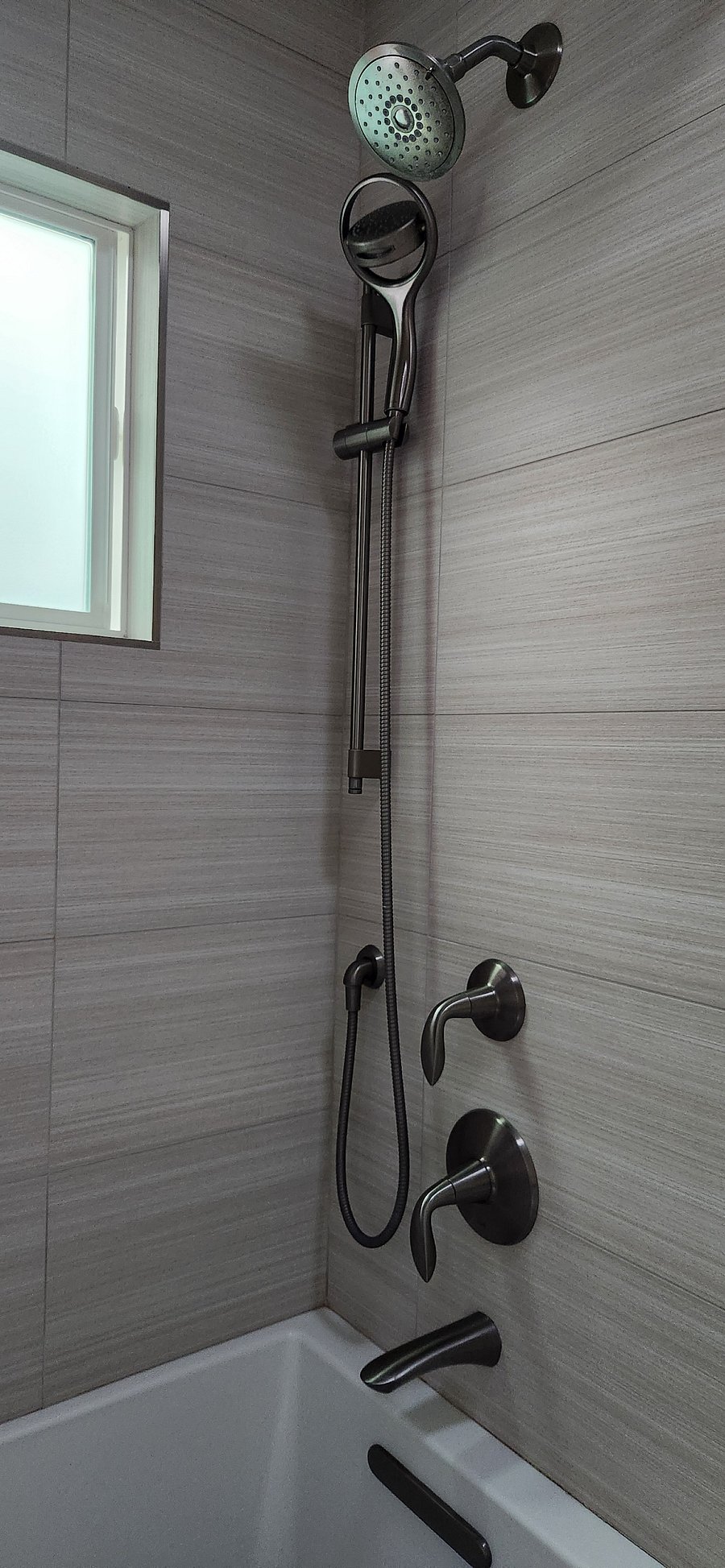Shower with adjustable wand fo a relaxing rinse.