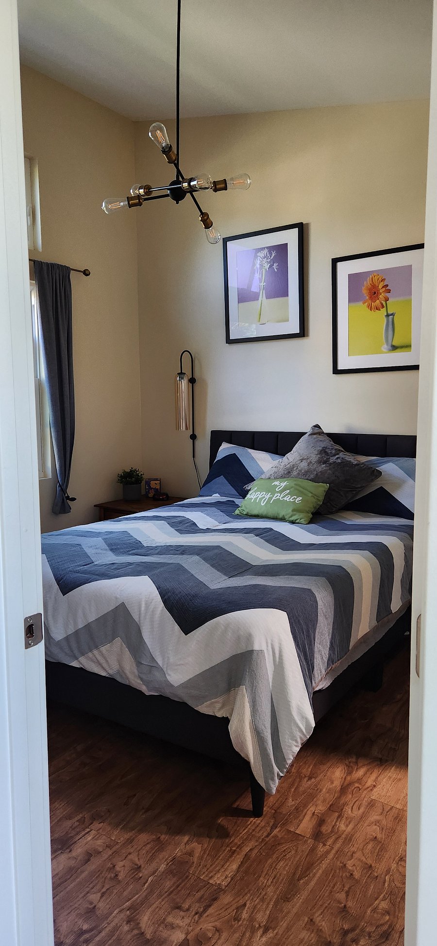 Comfortable Queen-sized bed for a cozy sleep.