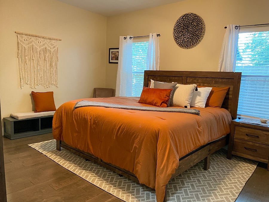Master bedroom featuring the king-sized bed.