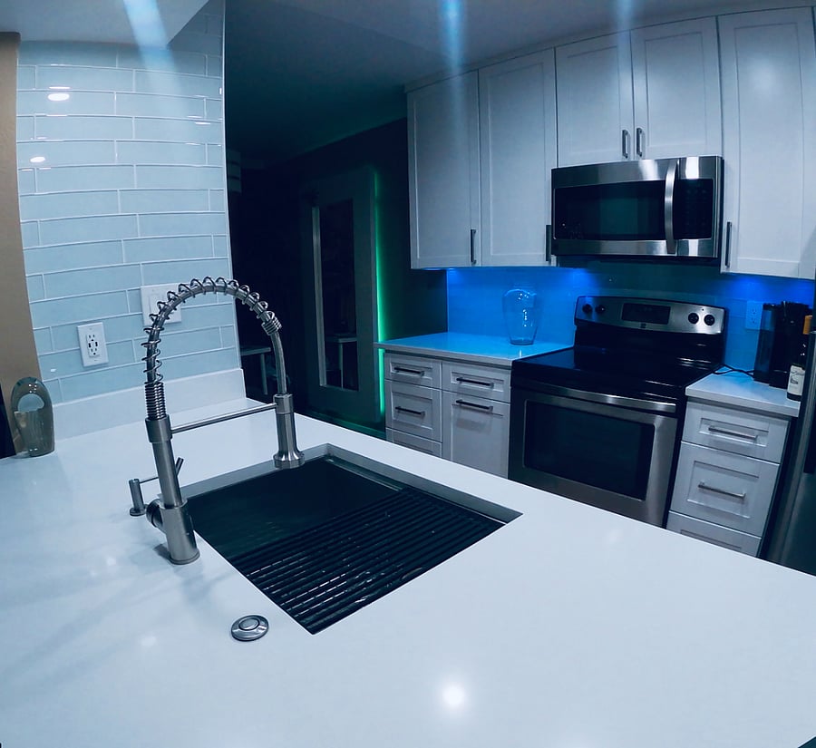 Under cabinet lighting adds a great mood with multiple colors