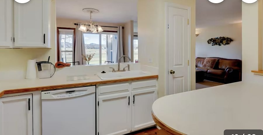 kitchen open to dining room and patio