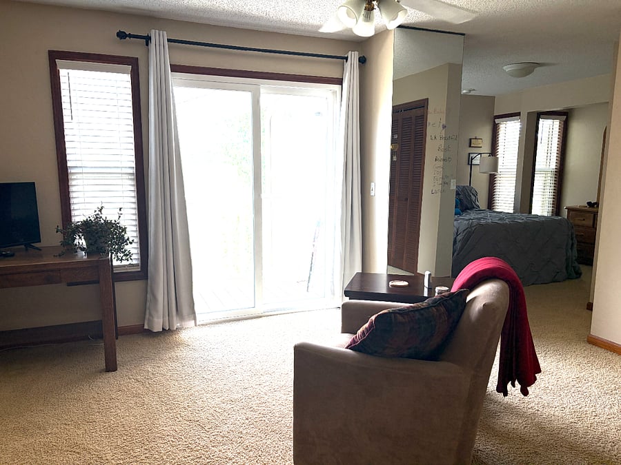 Master suite sitting area with upper patio