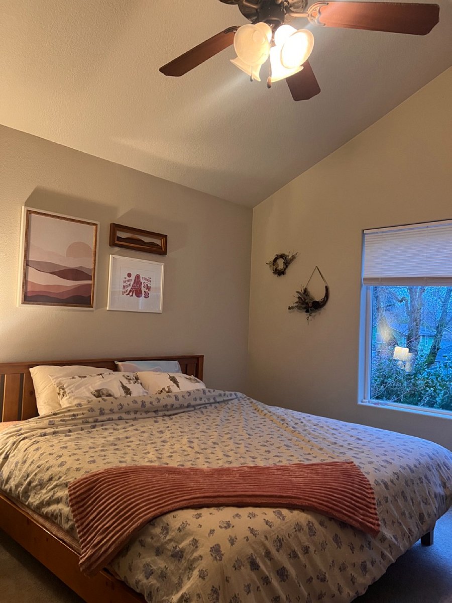 Primary bedroom at dusk.