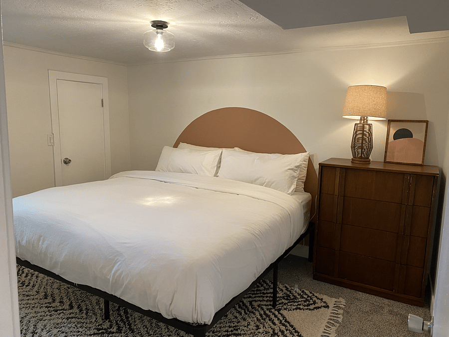 King Sized room with dresser for storage