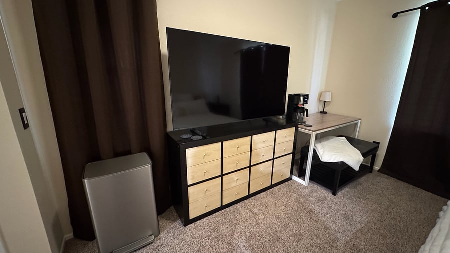 65 inch Smart TV
Both a drip and Keurig coffee maker 
Study Desk and Comfy Bench 