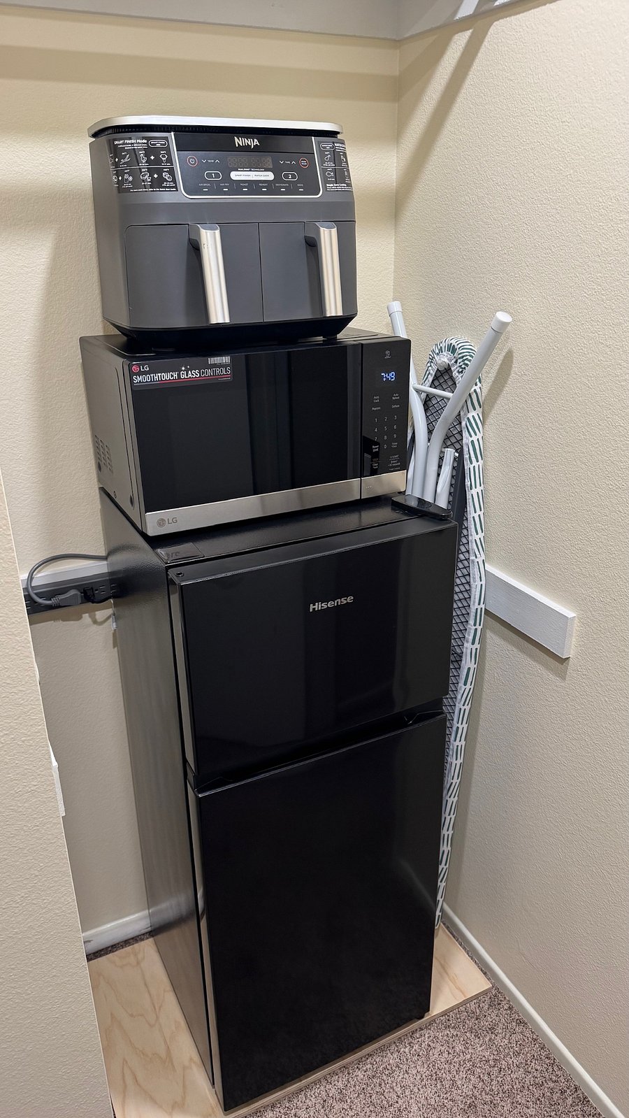 The room is equipped with: Refrigerator * Freezer * Microwave * Airfryer * Iron/Steamer * Garage access is provided for washer and dryer
