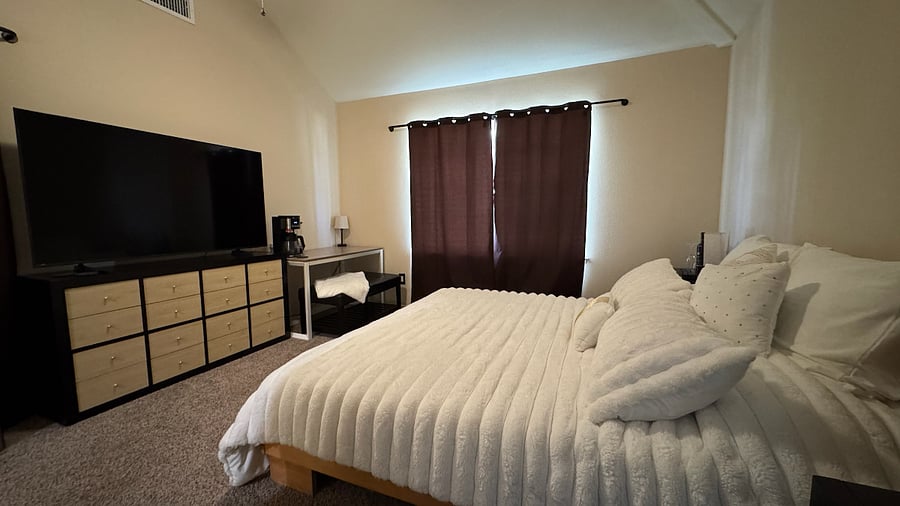 Large Dresser with ample storage 
Room Darkening Curtains 