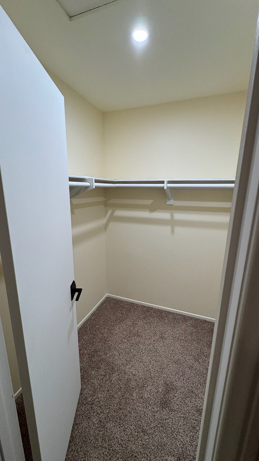 Large Walk-In Closet with hangers provided