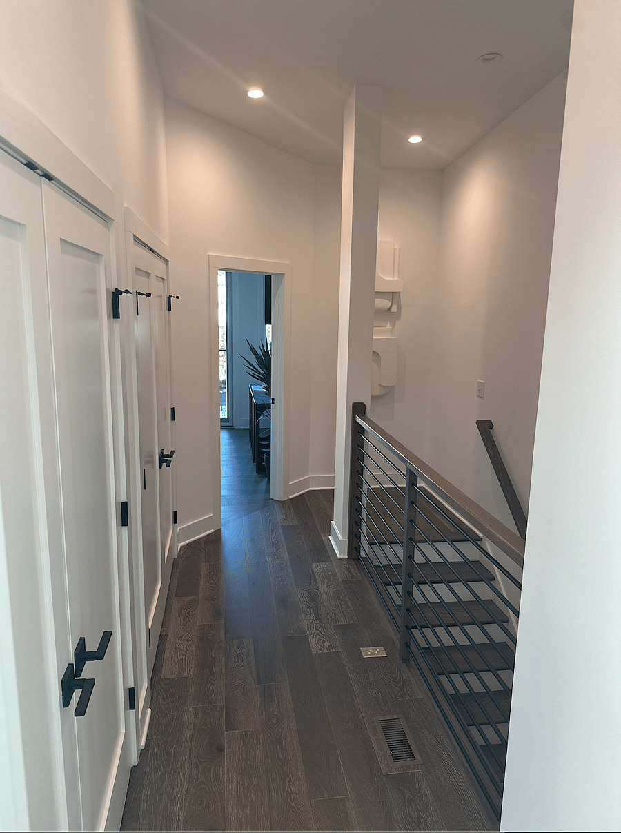 Upstairs Hallway Leading to the Primary Suite Entrance