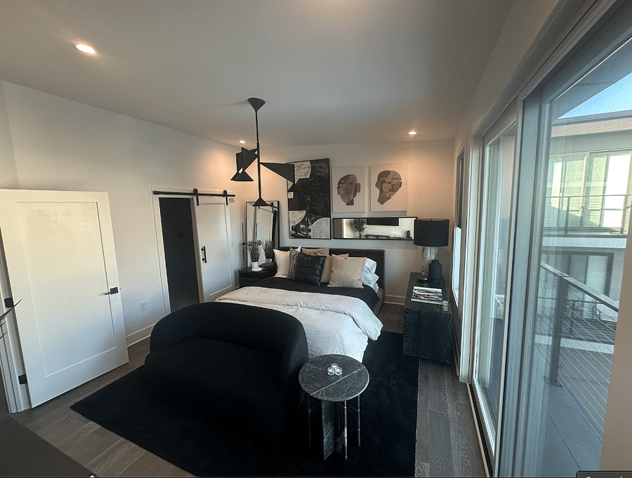 Primary Suite View to Bathroom Barn Door Entry