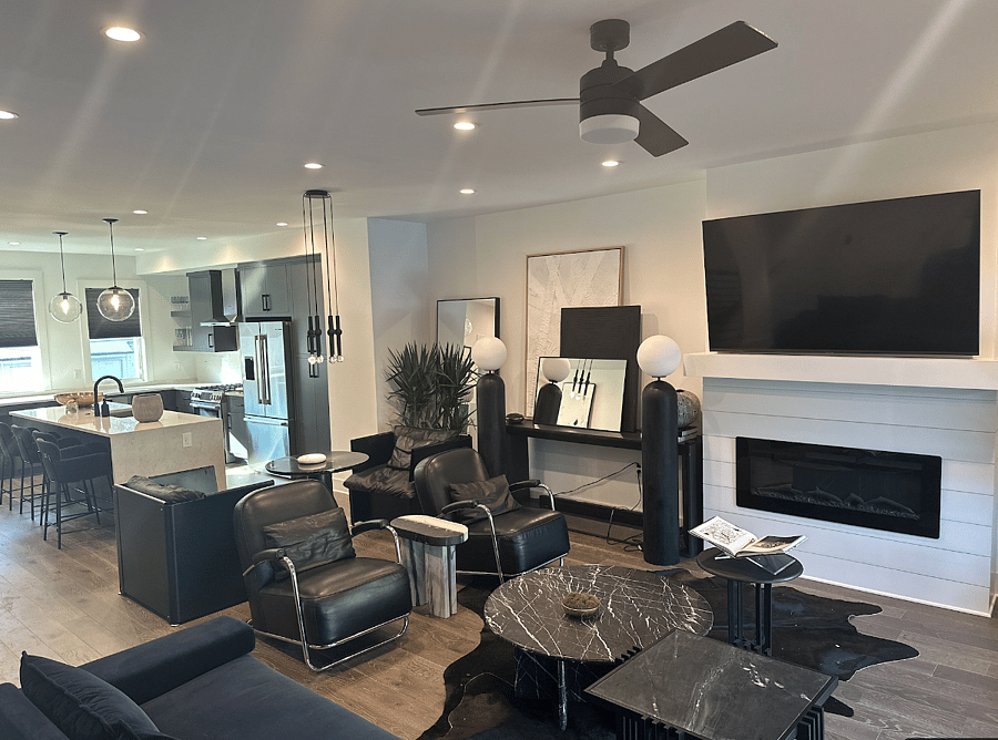 Dining Room and Living Room Fireplace Overlooking Kitchen