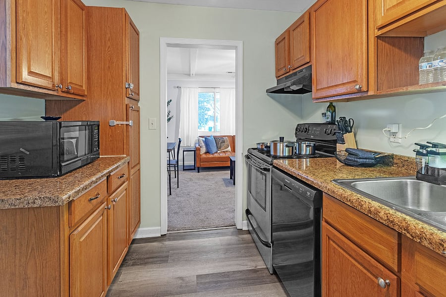 Microwave
Full size fridge
Dishwasher
Coffee maker
Blender
Eating utensils
Wine glass
Pots and pans