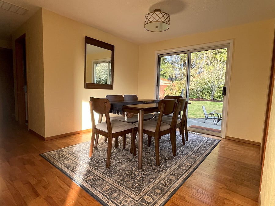 dining room with access to back patio and yard