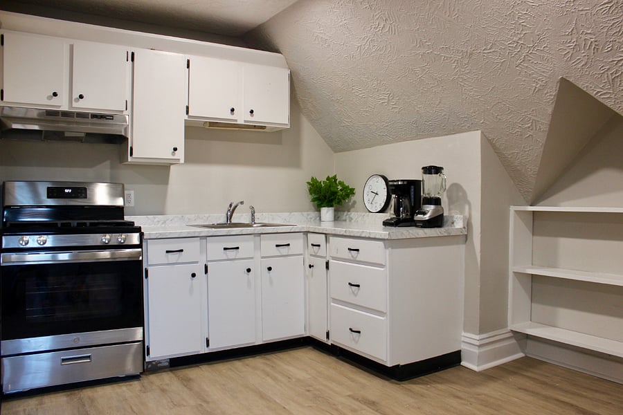 Updated kitchen features new stainless steel appliances