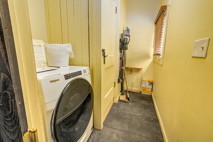 Laundry room combo washer/dryer, Iron and Board + cordless vacuum, broom with dust pan