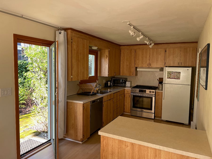 Kitchen with side door open