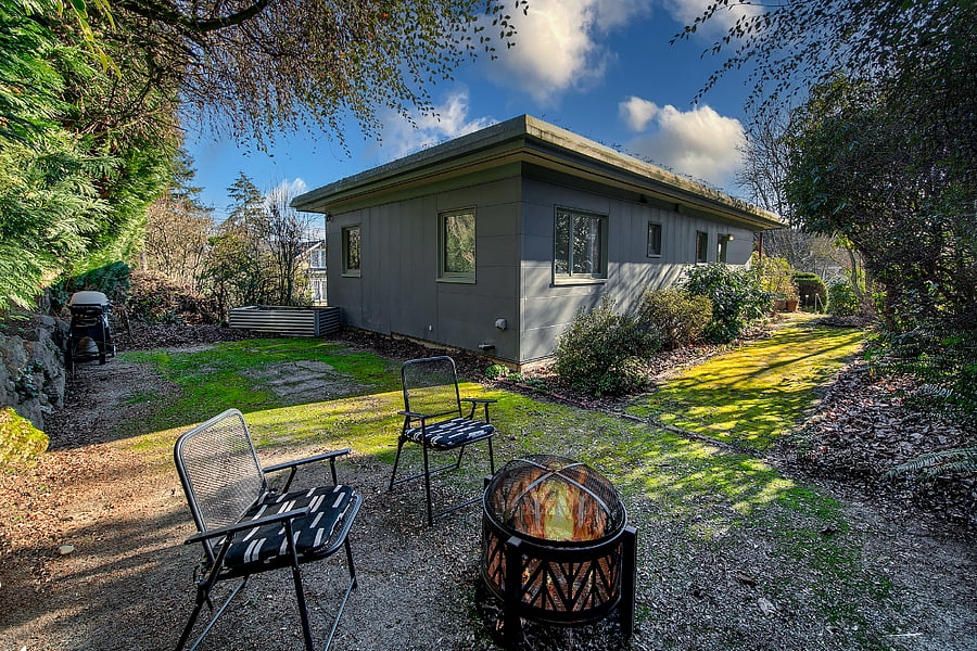 Back yard with fire pit and side yard