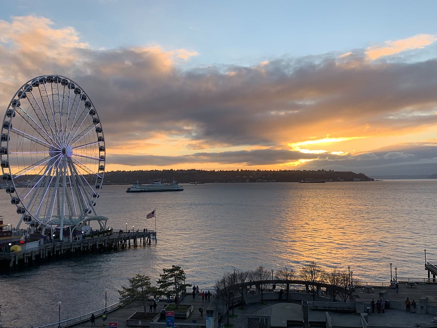 Ferris Wheel with ferry in background