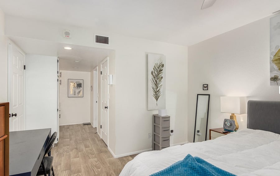 Bedroom facing towards bathroom