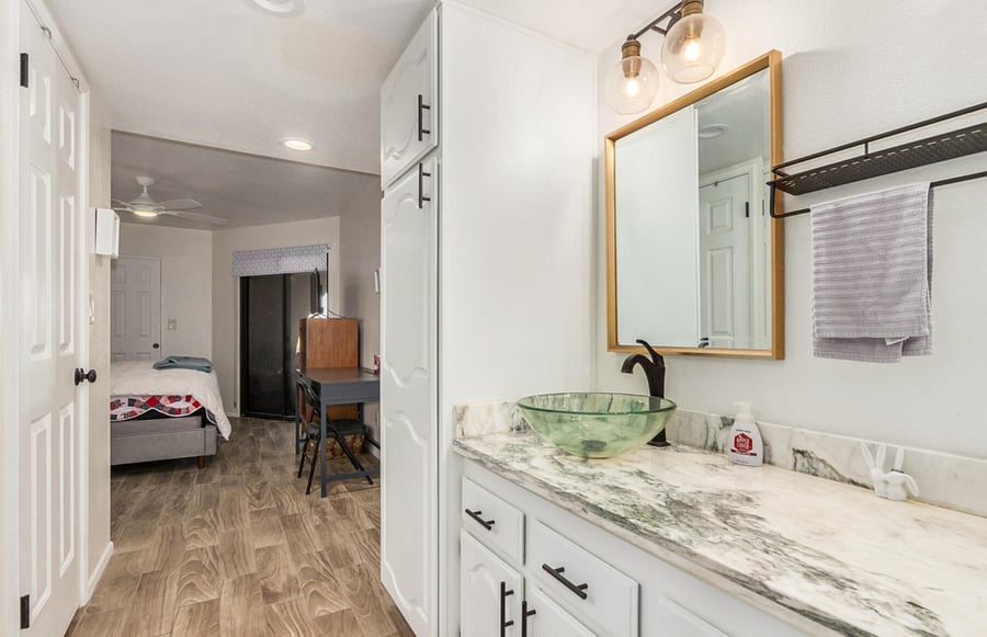 Bathroom facing towards bedroom