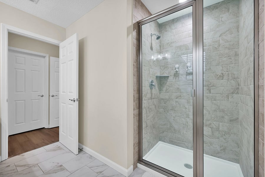 Primary suite bathroom features a walk in shower!