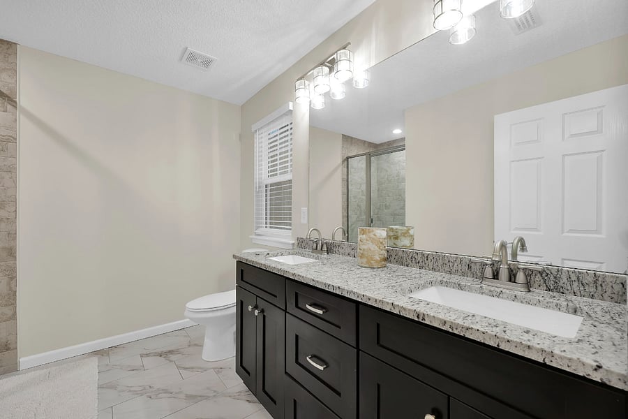Primary suite bathroom features double sinks!
