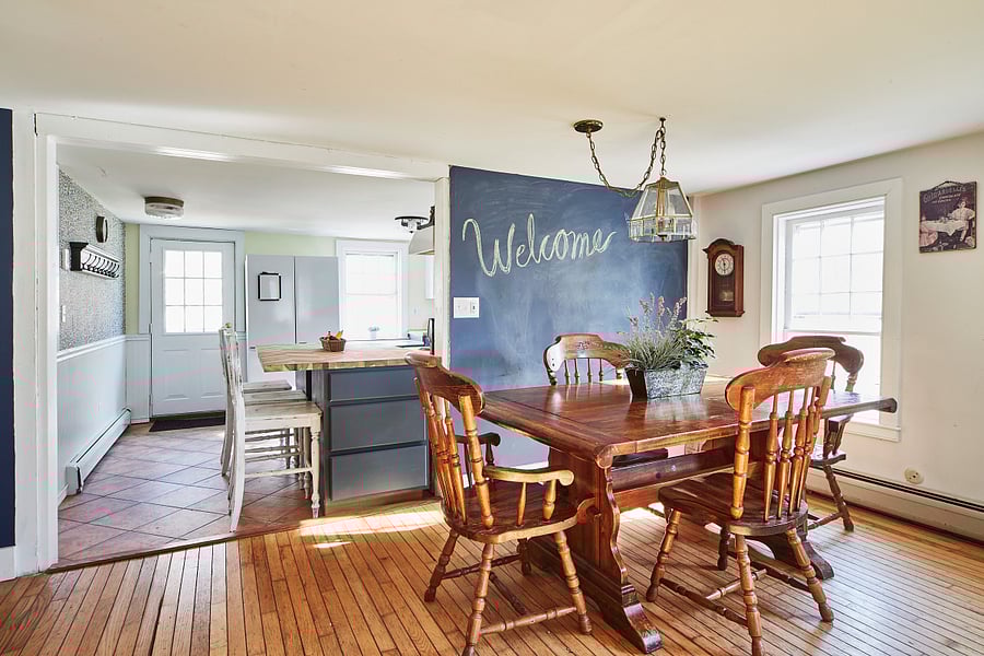 View from basement floor dining room into kitchen.