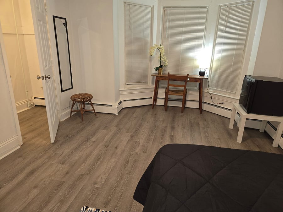 Expect a comfortable bed, night table, chair, mini fridge, and a dedicated workspace. High-speed WiFi and laundry access are included. The rooms are thoughtfully decorated with modern touches and provide a clean, welcoming environmentperfect for relaxing or getting work done.