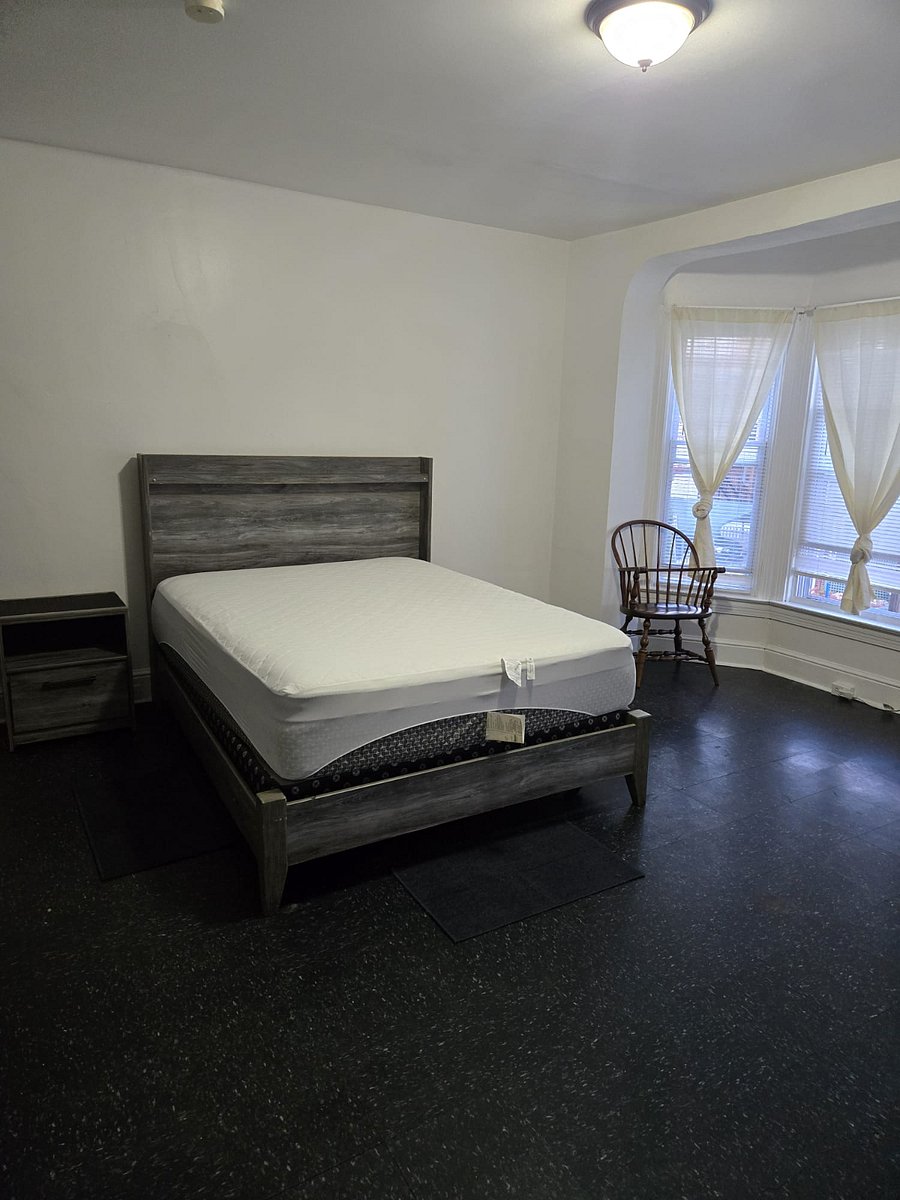 217 Kurtz Ave
Expect a comfortable bed, night table, chair, mini fridge, and a dedicated workspace. High-speed WiFi and laundry access are included. The rooms are thoughtfully decorated with modern touches and provide a clean, welcoming environmentperfect for relaxing or getting work done.