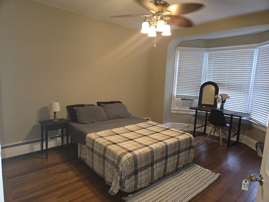 Expect a comfortable bed, night table, chair, mini fridge, and a dedicated workspace. High-speed WiFi and laundry access are included. The rooms are thoughtfully decorated with modern touches and provide a clean, welcoming environmentperfect for relaxing or getting work done.