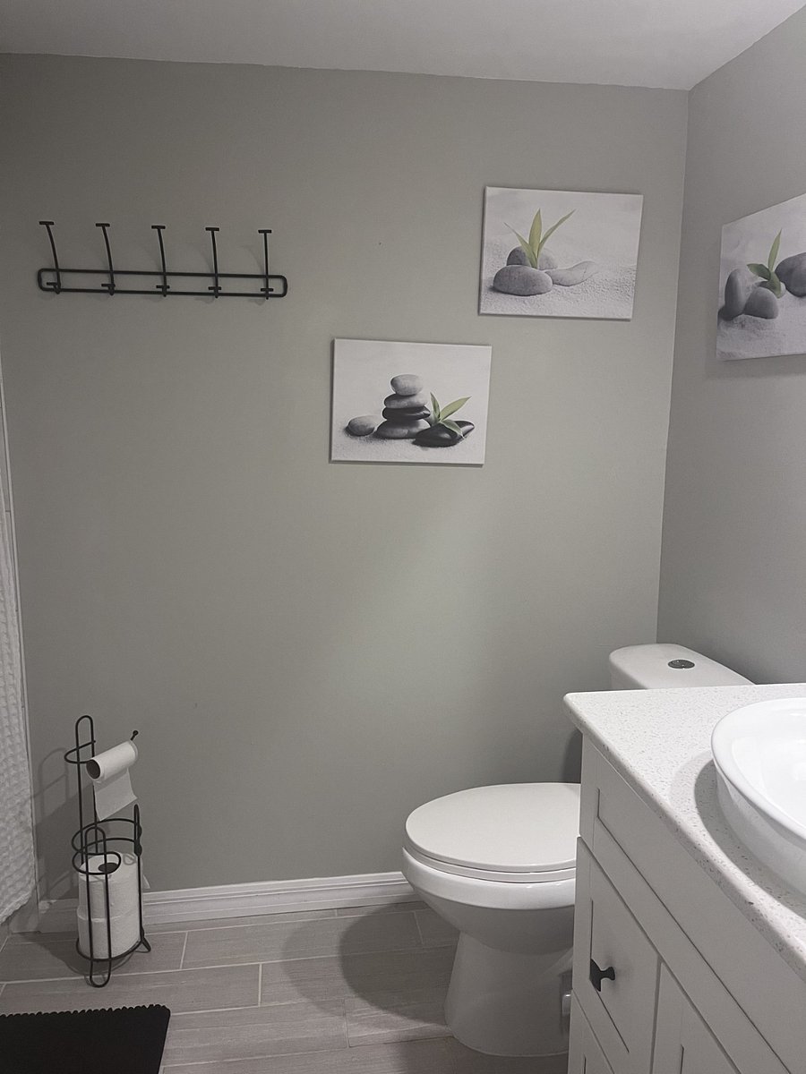 Secondary bedroom.  Tub with shower.