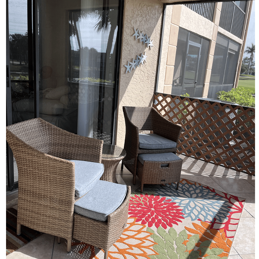 Back lanai.  Screened in with no-see-um screening.  Lanai opens to both the living room and primary bedroom.
