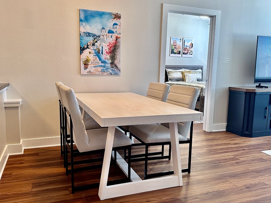 Dining table can comfortably fit 4.