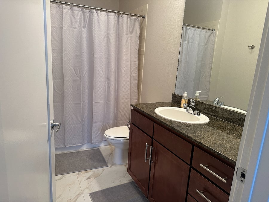 Oversize tub with shower. Linens and towels provided.
