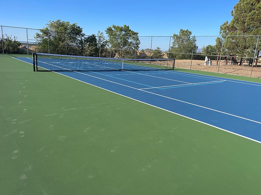 Full tennis court in estate community
