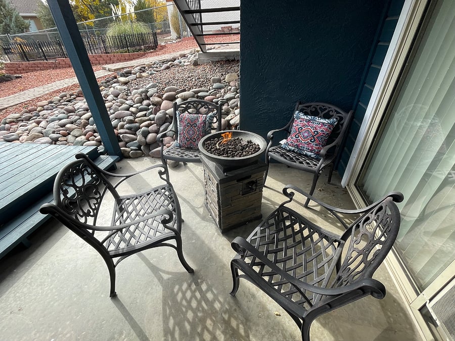Down stairs bedroom patio set with fire pit