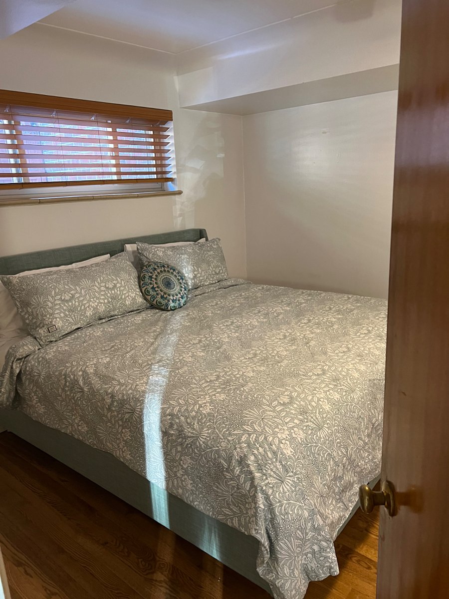 King Side bed with two nightstands with built in chargers. Large closet with dresser. Bench.