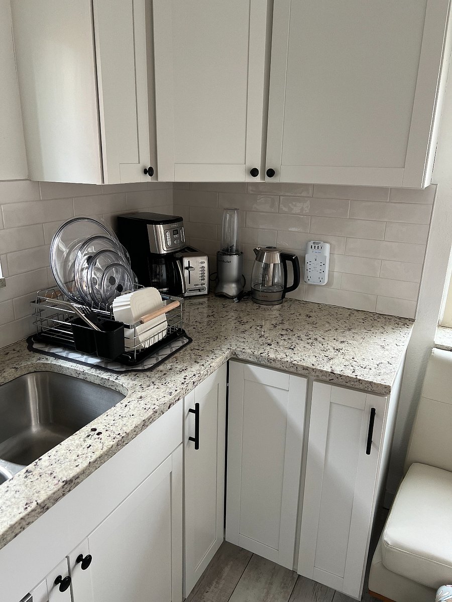 Pots pans for cooking and baking. Dishes and cutlery and glassware for six.