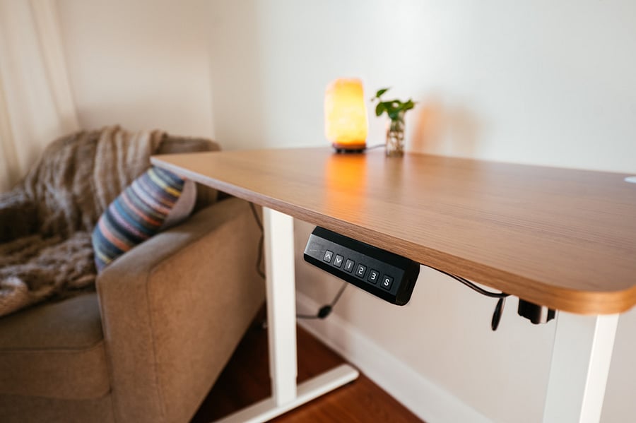 Your bedroom - with seating area and electric standing desk. You get a chair too.. :)