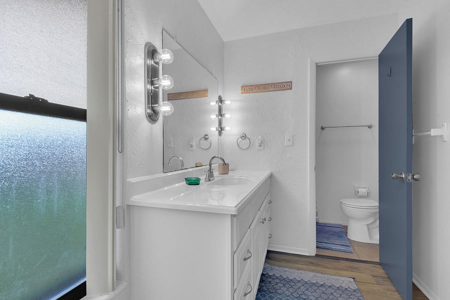 Nice vanity, with toilet and shower