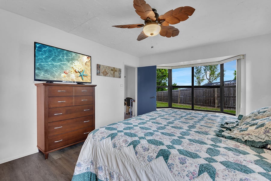 Primary Bedroom with King bed, TV and nice picture window