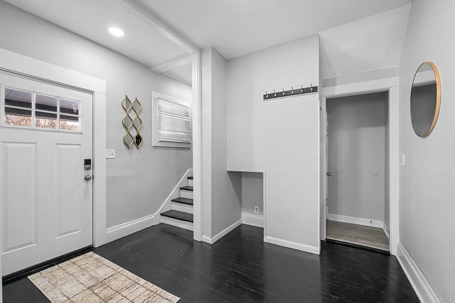 Fabulous foyer to get in out of the cold.  Mirrors to make sure you look great before you head out the door!