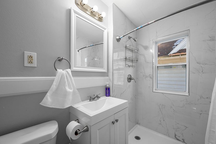 This is the upstairs bathroom that is shared by two of the traveling nurse guests.