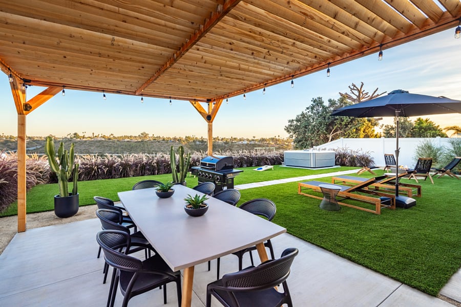 Enjoy dining under the covered pergola