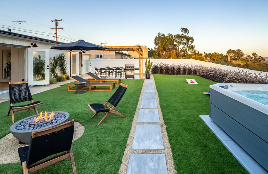 Fully enclosed private large backyard with fire pit and hot tub