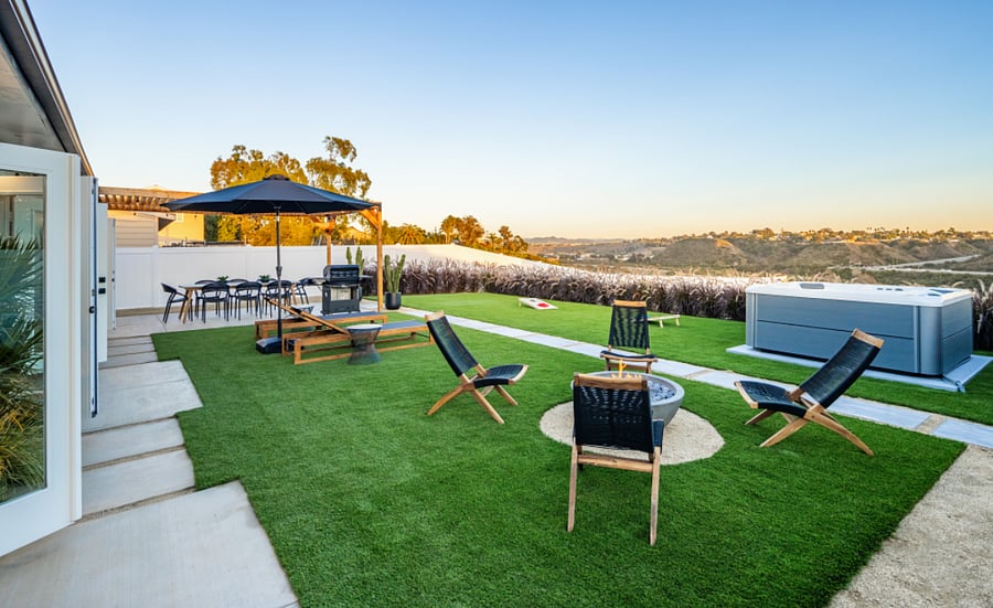 Fully enclosed private large backyard with fire pit and hot tub