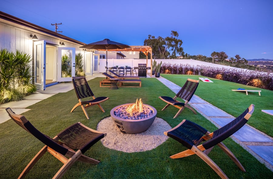 Fully enclosed private large backyard with fire pit and hot tub