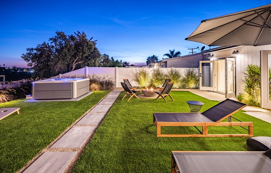 Fully enclosed private large backyard with fire pit and hot tub