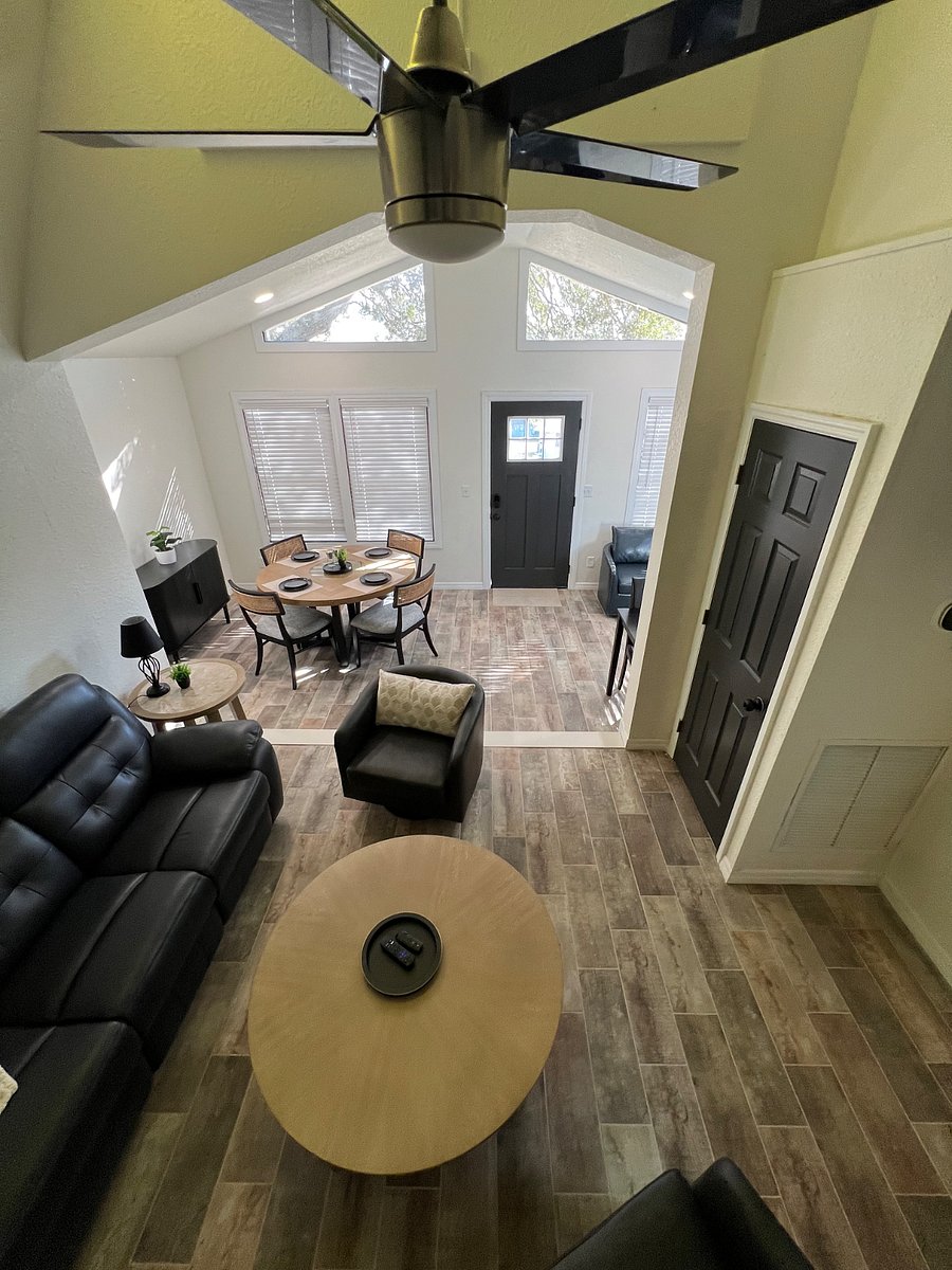Dining area, entry way, sitting area, computer table with 2 chairs, view from the loft bedroom. 
