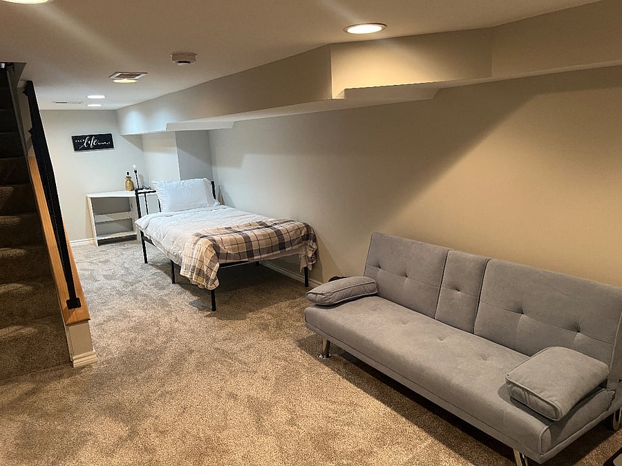 Finished Basement with two twin-xl mattresses + Smart-TV.
